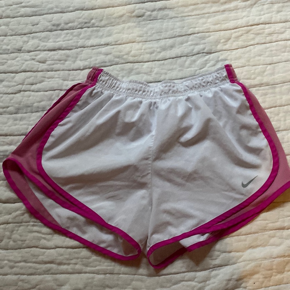 White and pink Nike shorts